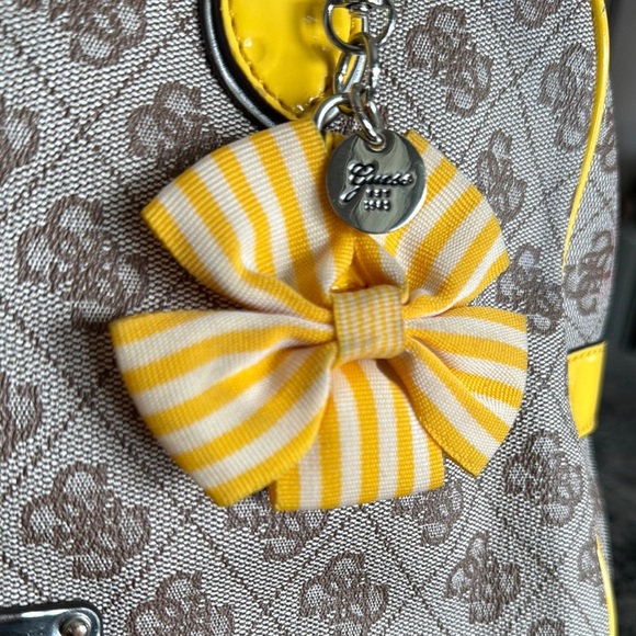Guess Cream and Yellow Satchel crossbody with Logo Pattern and Bright Accents - Picture 3 of 13